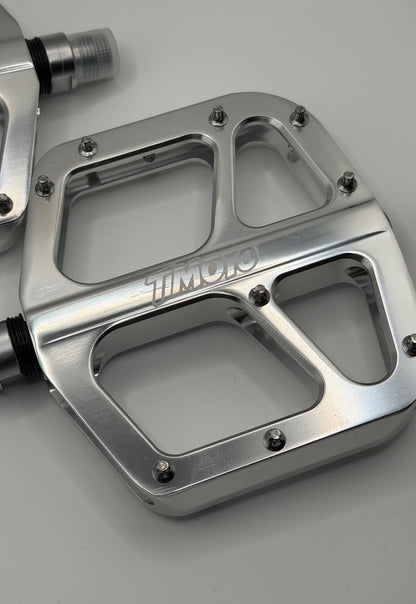close up of timoto logo on right timoto pedal
