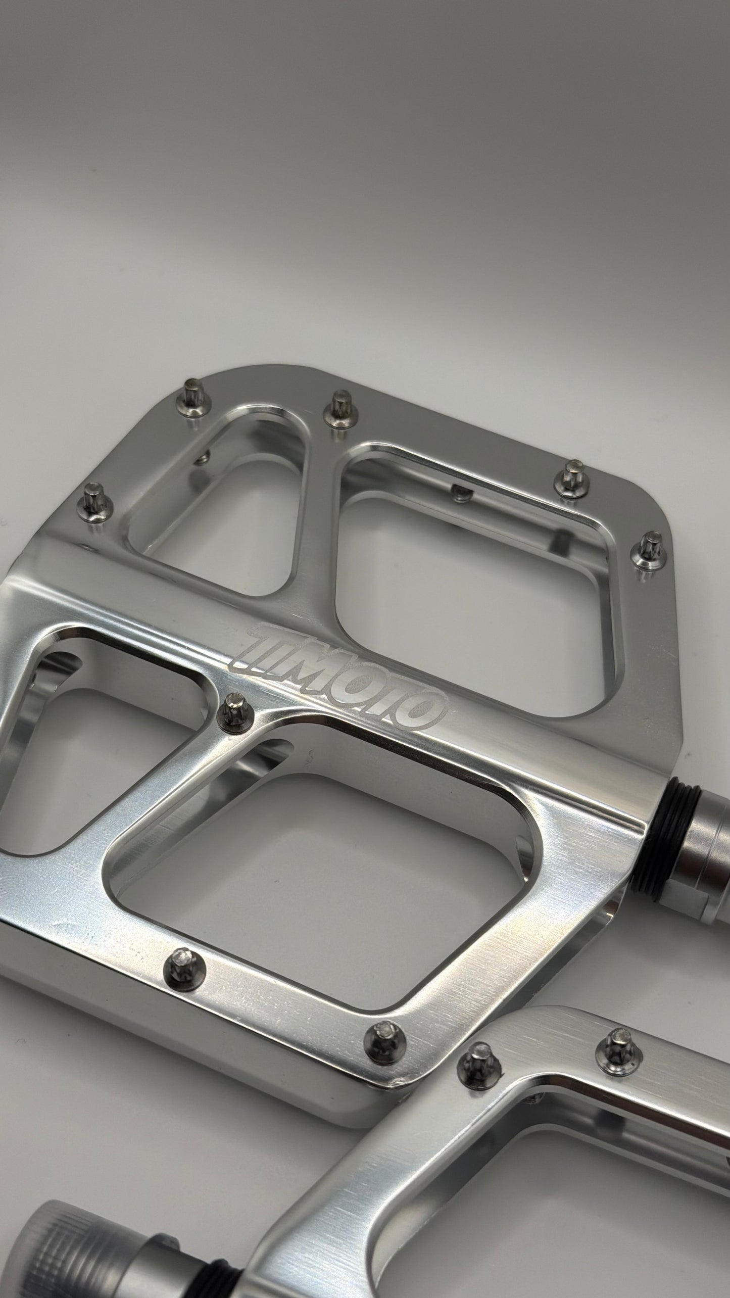 close up of timoto logo on left timoto pedal