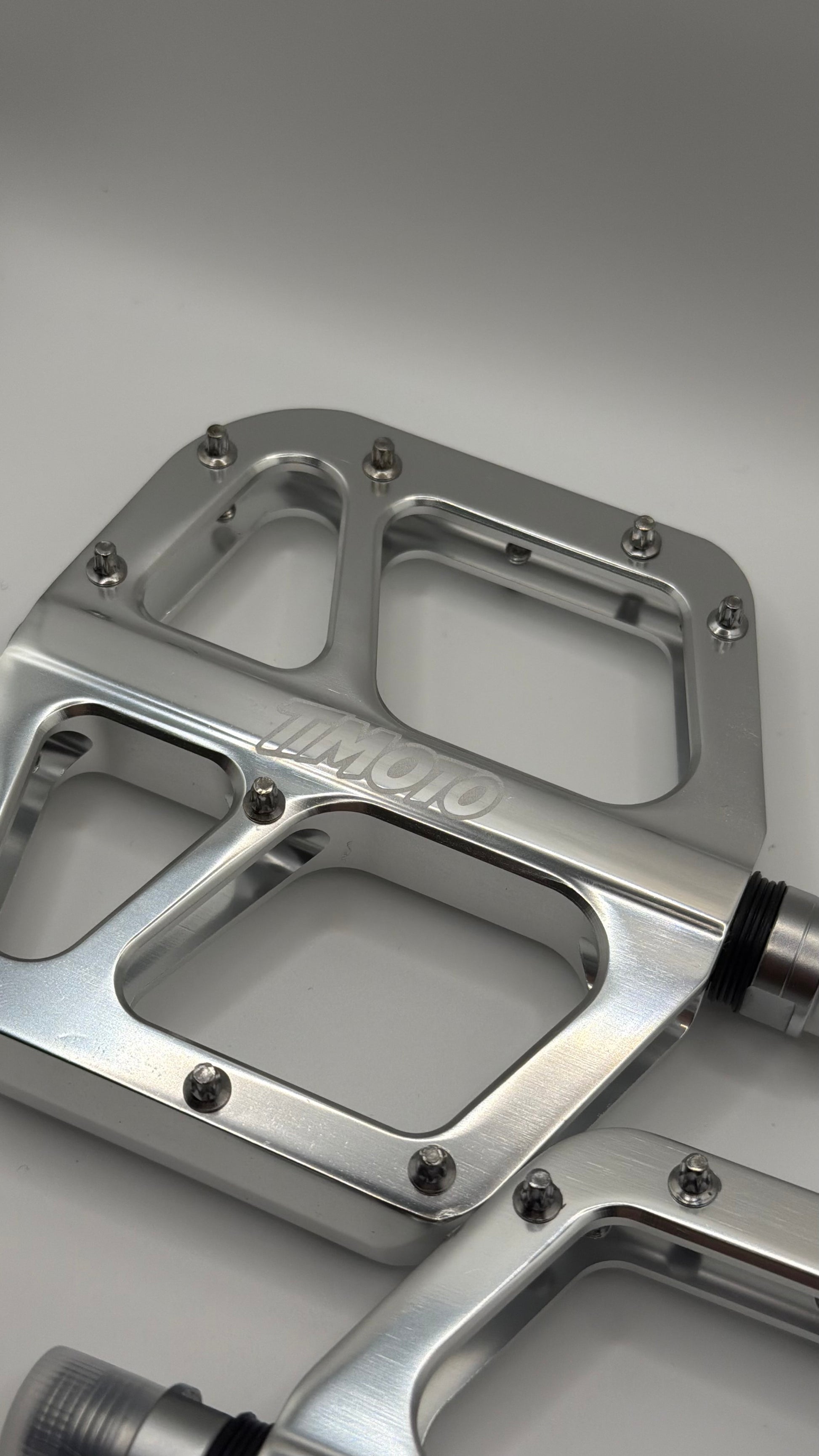 close up of timoto logo on left timoto pedal