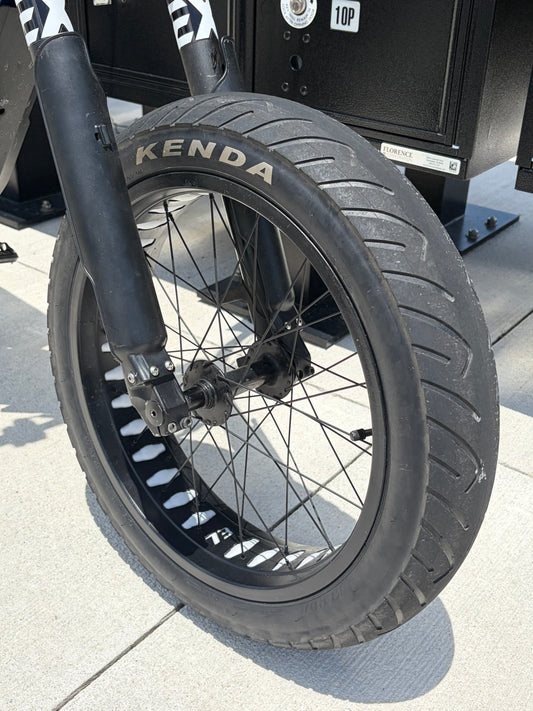 Close up of front kenda kraze supermoto tire on super73