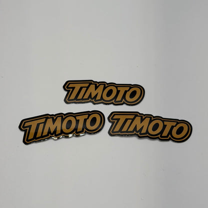 Three 'TIMOTO' logos on a light gray background